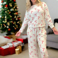 Festive Candy Cane Print – Perfect for Christmas mornings
 Relaxed Fit Crew Neck Top – Soft and breathable
Straight Leg Pants with Elastic Waistband & Drawstring – Adjustable comfort
Elastic Cuffs at Ankle – Stay-in-place fit for cozy wear
Inseam: 27"
Fabric: 96% Polyester / 4% Spandex – Stretchy 
