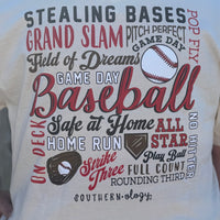 Southernology® Baseball Tee in cream with bold graphic on the back featuring iconic baseball phrases. Made from super-soft fabric for comfort, with a subtle Southernology® front logo. Perfect for baseball players, fans, and coaches, ideal for game day or casual wear.