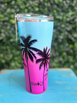 Tumbler 32oz - Island Sunset
Swig Tumbler 
Blue and Pink ombre background with palm tree details throughout 