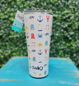 Swig Tumbler 32oz – Shoreline
Swing cups 
Beach print with hats, lobsters, anchors, shells, umbrellas, crabs and flowers