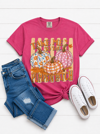 A pink graphic t-shirt with a fall pumpkin design and the text 'TAKE ME TO THE PUMPKIN PATCH