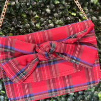 Enhance your holiday look with this stylish Tartan Purse, perfect for Christmas.