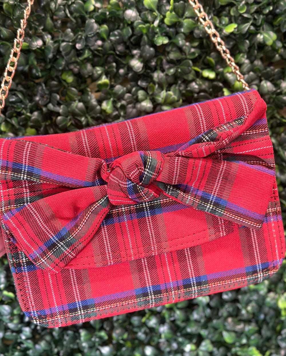 Enhance your holiday look with this stylish Tartan Purse, perfect for Christmas.