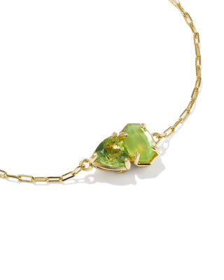 Brand | Kendra Scott
Style | Delicate Chain Bracelet
Design | Signature Elisa shape with a trillion-cut stone in August birthstone-inspired shades, a toi et moi ("you and me") style
Colorway | Light Green Mix
Metal | 14k Yellow Gold Over Brass
Closure | Lobster clasp with a single adjustable slider bead
Size | 8" inner circumference, 0.36" wide