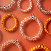 offer a strong grip without damage, doubling as a chic wrist accessory when not in use. Your new favorite hair essentials all year round.

Strong grip, no rip design for all-day hold

Doubles as a stylish bracelet
Durable and waterproof for all occasions
Gentle on hair—prevents breakage, headaches, and creases
