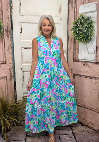 Make a statement with our tiered maxi dress! This tiered maxi dress features a flattering V-neckline and elegant collar detail, combining flowy style with effortless comfort. Lightweight, breathable, and wrinkle-free, it also offers optional UPF50+ sun protection—perfect for beach days, vacations, or casual summer evenings.

Details:
✨ Tiered maxi design with collar detail
✨ Flattering V-neckline
☀️ UPF50+ sun protection
👗 Lightweight, breathable, and wrinkle-free