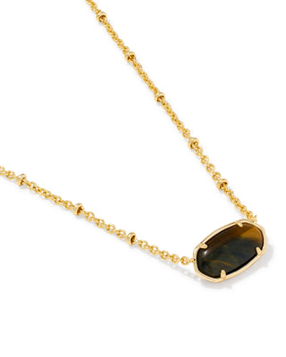 Design | Reversible: Dark Brown Hawks Eye stone on one side, openwork animal-print pattern on the other
Stone | Dark Brown Hawks Eye
Finish | Gold
Length | 16" chain with a 3" extender for an adjustable fit
Pendant | 0.67"L x 0.36"W
Style | Short pendant, perfect for layering or wearing solo

