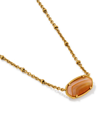 Design | Reversible: Orange Banded Agate stone on one side, openwork animal-print pattern on the other
Stone | Orange Banded Agate
Finish | Vintage Gold
Length | 16" chain with a 3" extender for an adjustable fit
Pendant | 0.67"L x 0.36"W
Style | Short pendant, perfect for layering or wearing solo
