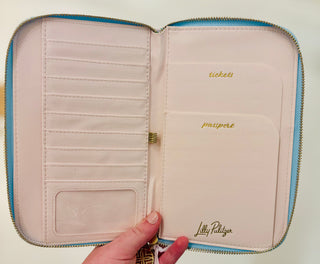 Lilly Pulitzer zipper wallet, Bamboo Logo Trellis wallet, travel organizer wallet, passport wallet, Lilly Pulitzer travel accessories, zipper wallet with pockets, stylish travel wallet. Lilly Pulitzer Bamboo Logo Trellis zipper wallet with gold logo plaque and bamboo zipper pull, designed for travel essentials