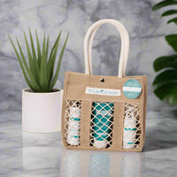 This coastal gift set features everything you need for a day on the coast... our best selling Mineral Lotion, Beach Hair, and Coastal Rose Face Spritz. Packed with our full size bottles, all approved to fly with you.&nbsp;

Hand made beach tote included!

- Made with ocean water
- Made in the USA
- (3) full size products included

Experience True Ocean's line of ocean water body care today! Perfect beach gift, souvenir, coastal decor, mother's day gift, father's day gift, birthday gift, unisex fragrances, l