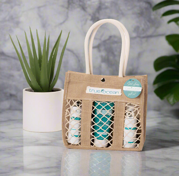 This coastal gift set features everything you need for a day on the coast... our best selling Mineral Lotion, Beach Hair, and Coastal Rose Face Spritz. Packed with our full size bottles, all approved to fly with you. 

Hand made beach tote included!

- Made with ocean water
- Made in the USA
- (3) full size products included

Experience True Ocean's line of ocean water body care today! Perfect beach gift, souvenir, coastal decor, mother's day gift, father's day gift, birthday gift, unisex fragrances, l