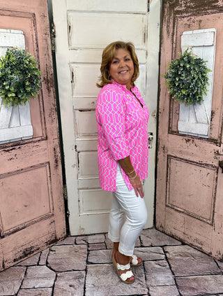 Lulu-B women’s V-neck travel tunic top with UPF50+ sun protection, nylon spandex fabric, button placket, 3/4 sleeves, straight hemline with side slits, lightweight and comfortable for travel and everyday wear.