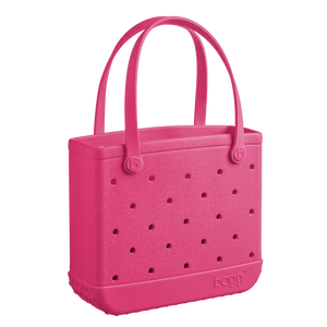 Add a pop of color with the Bogg Bag Watermelon Shimmer! This stylish, durable, & waterproof tote is perfect for beach days, poolside fun, & everyday adventures