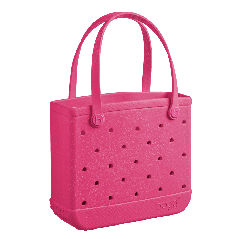 Add a pop of color with the Bogg Bag Watermelon Shimmer! This stylish, durable, & waterproof tote is perfect for beach days, poolside fun, & everyday adventures