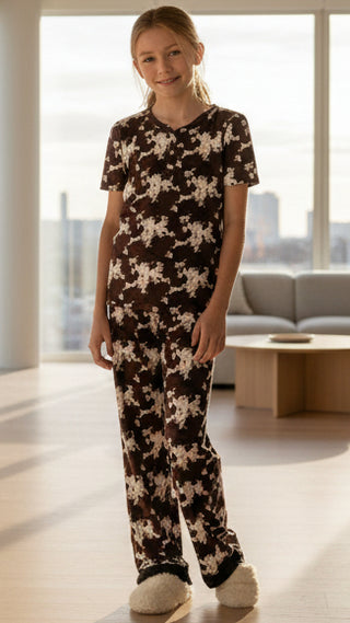 Youth Simply Southern PJ Set 
Design/Pattern: Brown Cow Print 
Set: short sleeve vneck tee and long pants with ruffle trim hem at bottom of pants