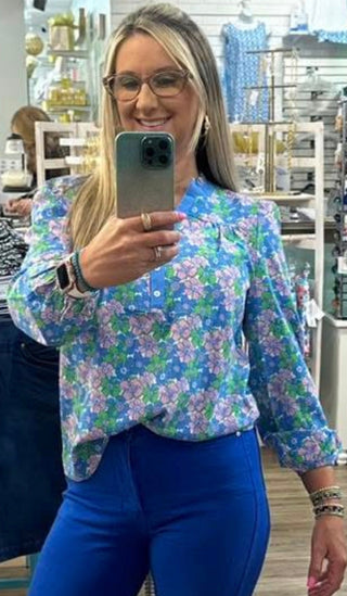 The Gianna Top adds personality to an everyday essential. Designed with a button-front placket, long sleeves with elastic cuffs, and a ruffle neckline, it’s easy to wear and full of charm. Pair it with your favorite denim for laid-back days or style it with tailored pieces for a dressed-up look that still feels effortless.