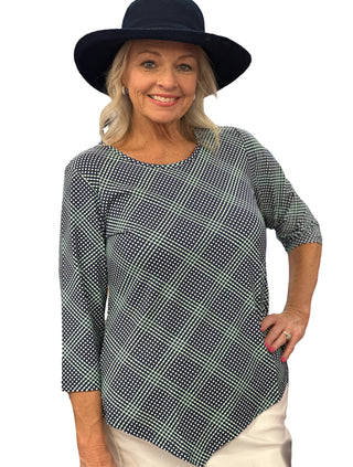 Stay stylish and protected in the Lulu-B Asymmetrical Top, crafted from a stretchy nylon-spandex blend. This flattering scoop-neck top features 3/4 sleeves and a chic asymmetrical hemline. With built-in UPF 50 sun protection and pre-shrunk fabric, it's perfect for sunny days, travel, or everyday wear—easy, polished, and effortlessly comfortable.

