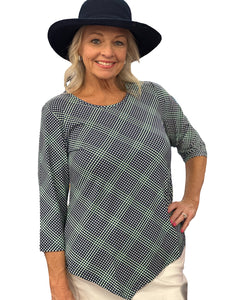 Stay stylish and protected in the Lulu-B Asymmetrical Top, crafted from a stretchy nylon-spandex blend. This flattering scoop-neck top features 3/4 sleeves and a chic asymmetrical hemline. With built-in UPF 50 sun protection and pre-shrunk fabric, it's perfect for sunny days, travel, or everyday wear—easy, polished, and effortlessly comfortable.

