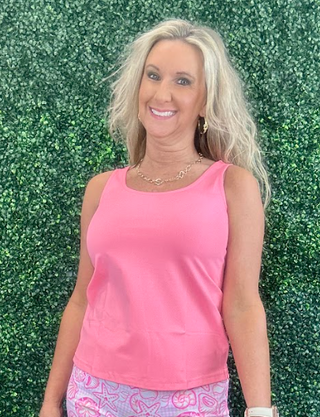 Sleek, simple, and effortlessly stylish! This sleeveless tank is made from a soft, stretchy 92% Nylon / 8% Spandex blend and features a classic tank neckline with a straight hemline. With a center back length of 24 inches and pre-shrunk fabric, it offers a flattering fit that lasts. Easy to care for—just machine wash and wear again and again!