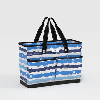 Ben Pocket Tote - Catch My Drift
Scout tote
blue wave pattern with white sailboat detail
