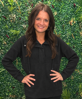 Color | Black
Fabric Feel | Soft, textured ribbed knit
Fabric Content | 81% polyester, 19% spandex
Neckline | Half zip
Finishing Detail | Shimmer detail