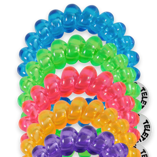 TELETIES Tiny Hair Ties in You Glow Girl Colors. Bright Fun multi pack hair ties. 
These mini hair coils are designed to fit an adult finger like a ring rather than a bracelet, offering a strong, damage-free grip that keeps hair in place all day—without breakage, creases, or headaches.